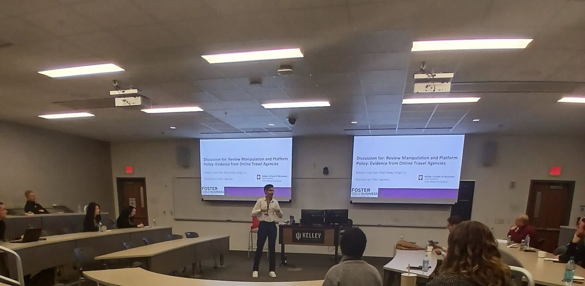 Erfan Loghmani discussing the paper "Review Manipulation and Platform Policy: Evidence from Online Travel Agencies" by Liujie Qian, Zhexi Zhang, and Hongju Liu at the 2025 Haring Symposium.